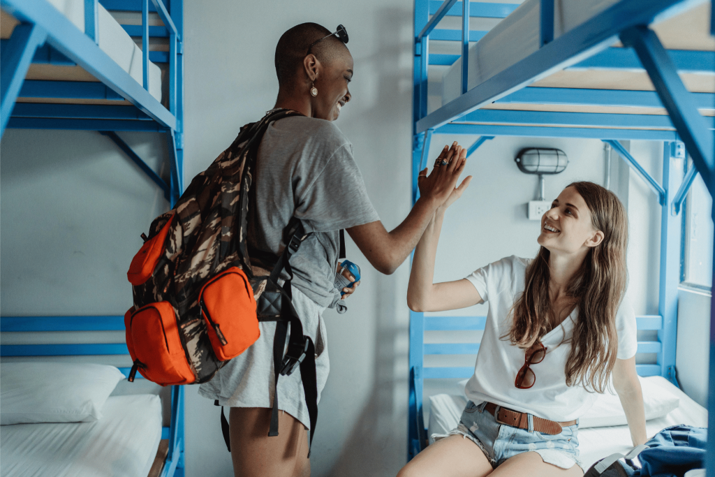 Entry level travel jobs - Backpackers working at a hostel. Digital nomad. Tengah travel app