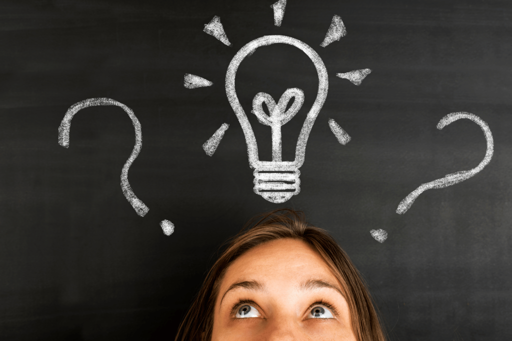 A woman thinking about travel trivia answers