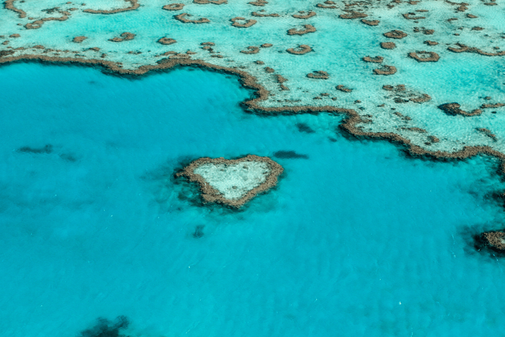An aerial shot of the heart shaped reef at the Great Barrier Reek in North Queensland, Australia.